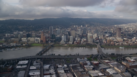 AX153_127.0000000F - Aerial stock photo of Hawthorne and Morrison Bridges, and skyscrapers in Downtown Portland, Oregon