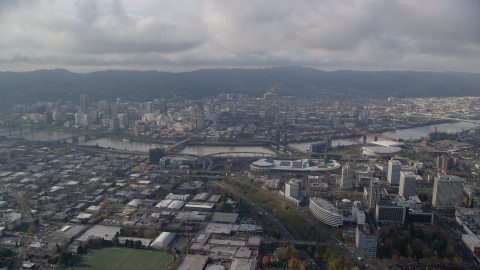 AX153_129.0000262F - Aerial stock photo of Downtown Portland, Willamette River, and convention center in Oregon