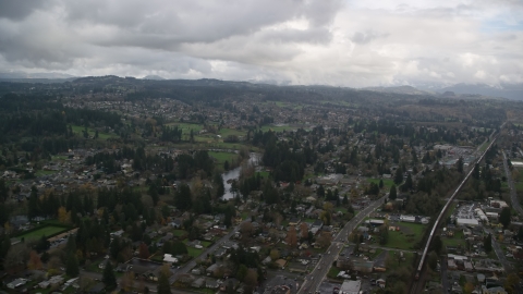 AX153_162.0000217F - Aerial stock photo of Neighborhoods in the small town of Washougal, Washington