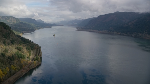 AX153_185.0000354F - Aerial stock photo of The wide river in the Columbia River Gorge, Oregon