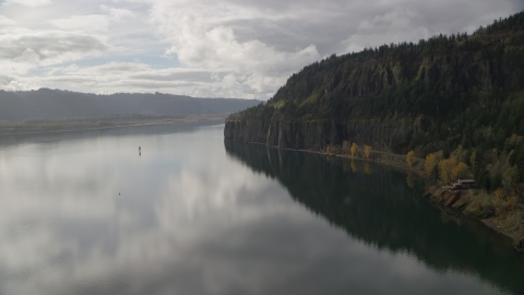 AX154_008.0000000F - Aerial stock photo of Isolated home beside the river in Columbia River Gorge, Washington