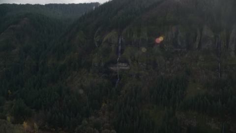 Waterfall on a Columbia River Gorge cliff face in Multnomah County, Oregon Aerial Stock Photos | AX154_018.0000340F