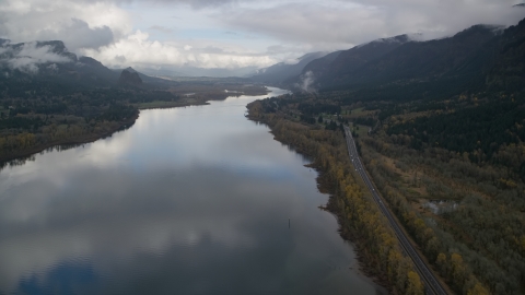 AX154_023.0000312F - Aerial stock photo of The Columbia River and I-84 through Columbia River Gorge, Multnomah County, Oregon