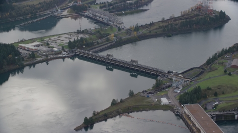 AX154_033.0000329F - Aerial stock photo of The Bonneville Dam in Columbia River Gorge