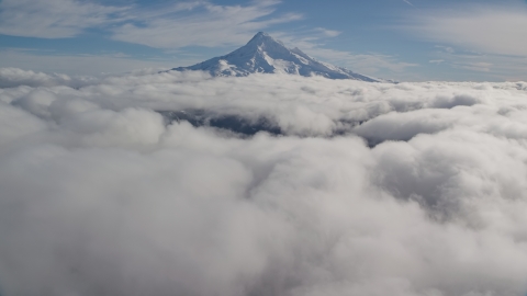 The snowy summit and a blanket of clouds, Mount Hood, Cascade Range, Oregon Aerial Stock Photos | AX154_066.0000000F