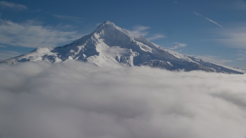 The Mount Hood summit with snow and low clouds, Cascade Range, Oregon Aerial Stock Photos | AX154_074.0000339F