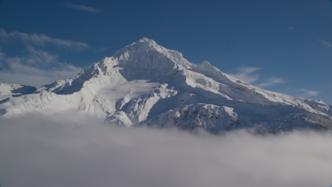 AX154_078.0000000F - Aerial stock photo of A view of snow-covered Mount Hood, Cascade Range, Oregon