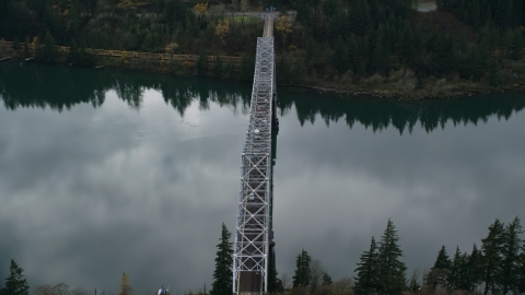 AX154_173.0000102F - Aerial stock photo of Traffic crossing Bridge of the Gods in Cascade Locks, Columbia River Gorge, Oregon