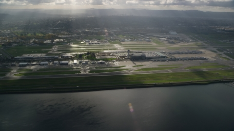 Godrays shining down on the Portland International Airport in Oregon Aerial Stock Photos | AX154_220.0000072F