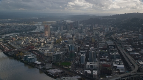 AX154_228.0000000F - Aerial stock photo of Skyscrapers and Interstate 405 in Downtown Portland, Oregon