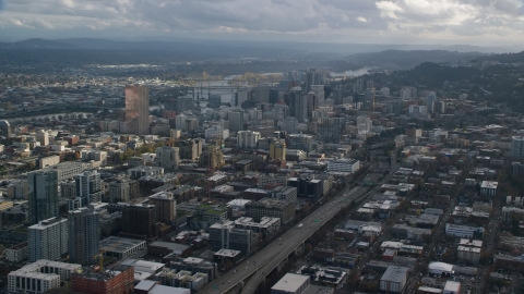 AX154_228.0000285F - Aerial stock photo of A view of skyscrapers and Interstate 405 in Downtown Portland, Oregon