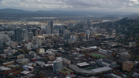 AX154_229.0000308F - Aerial stock photo of Skyscrapers seen from Providence Park in Downtown Portland, Oregon