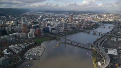 AX154_235.0000000F - Aerial stock photo of Skyscrapers in Downtown Portland, Oregon, seen from the Willamette River