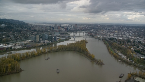 AX155_021.0000291F - Aerial stock photo of South Waterfront condo high-rises, Willamette River, and Downtown Portland