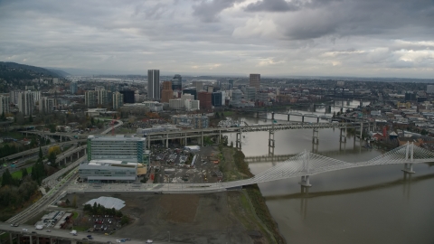 AX155_027.0000292F - Aerial stock photo of Ross Island Bridge to Downtown Portland, Oregon