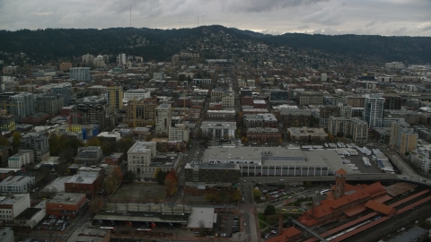 AX155_032.0000027F - Aerial stock photo of Downtown buildings and Union Station in Downtown Portland, Oregon