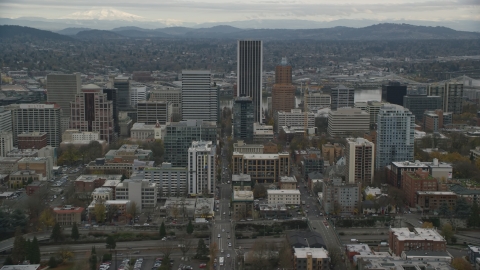 AX155_058.0000000F - Aerial stock photo of Skyscrapers and downtown buildings by Wells Fargo Center in Downtown Portland, Oregon