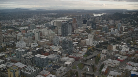 AX155_067.0000088F - Aerial stock photo of Downtown Portland, Oregon cityscape and the I-405 freeway