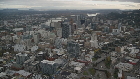 AX155_067.0000137F - Aerial stock photo of Downtown Portland, Oregon cityscape and the I-405 freeway