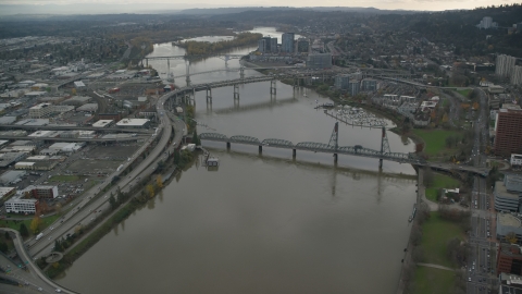 AX155_069.0000000F - Aerial stock photo of Marquam Bridge, Riverplace Marina, Hawthorne Bridge near Downtown Portland, Oregon