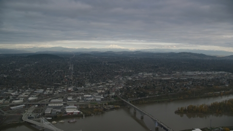 AX155_093.0000000F - Aerial stock photo of Warehouses and suburban neighborhoods in Southeast Portland, Oregon