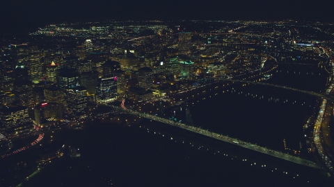 AX155_359.0000000F - Aerial stock photo of Downtown cityscape, bridges over the Willamette River at night, Portland, Oregon