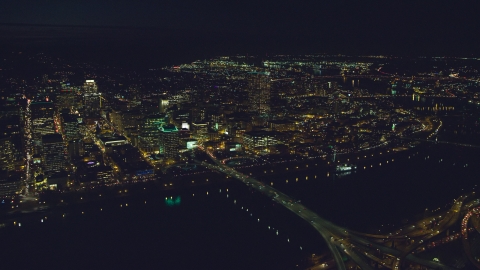 AX155_360.0000006F - Aerial stock photo of Downtown Portland, the Morrison Bridge and the Burnside Bridge over Willamette River, night, Oregon