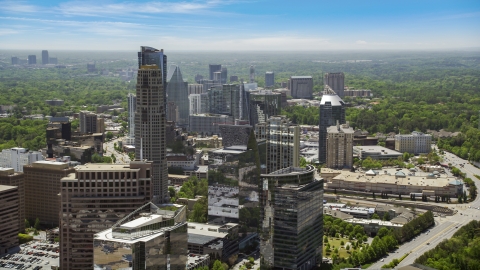 AX36_073.0000186F - Aerial stock photo of Skyscrapers and office buildings on a hazy day, Buckhead, Georgia