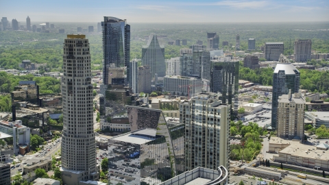 AX36_075.0000000F - Aerial stock photo of Skyscrapers near Marsh Mercer Building, Buckhead, Georgia