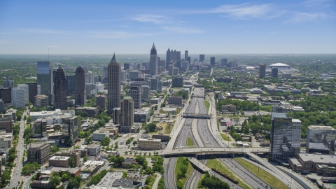 Downtown Connector toward Midtown Atlanta skyscrapers, hazy, Georgia Aerial Stock Photos | AX36_086.0000141F