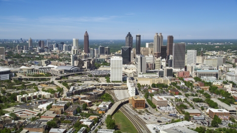 AX37_011.0000045F - Aerial stock photo of Midtown skyscrapers with Downtown Atlanta in the distance, Georgia