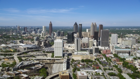 AX37_011.0000209F - Aerial stock photo of Midtown skyscrapers with Downtown Atlanta in the distance, Georgia