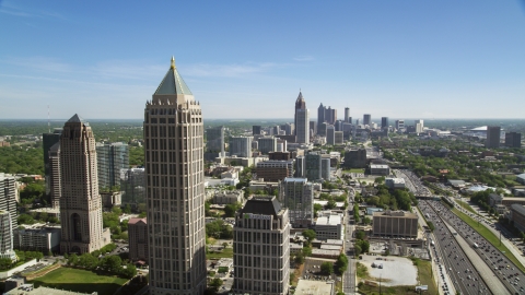 AX37_041.0000075F - Aerial stock photo of Midtown Atlanta skyscrapers and office buildings along Downtown Connector, Georgia