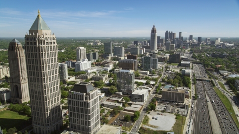 AX37_041.0000178F - Aerial stock photo of Midtown Atlanta skyscrapers and office buildings along Downtown Connector, Georgia