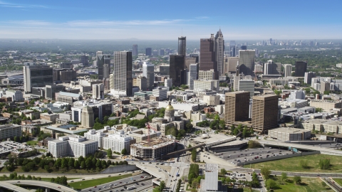 AX37_063.0000052F - Aerial stock photo of State Capitol and skyscrapers, Downtown Atlanta, Georgia