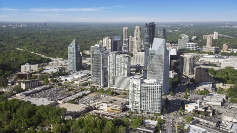 AX38_013.0000099F - Aerial stock photo of Terminus Atlanta and surrounding skyscrapers, Buckhead, Georgia