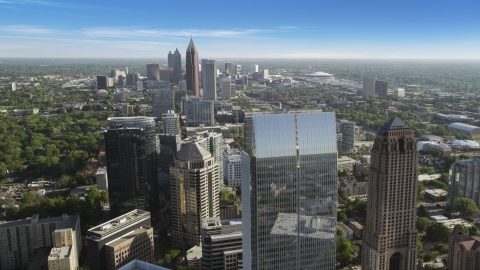 Midtown skyscrapers with more skyscrapers in the distance, Atlanta, Georgia Aerial Stock Photos | AX38_067.0000313F