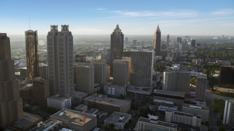 AX39_017.0000284F - Aerial stock photo of Skyscrapers and office buildings; Downtown Atlanta, Georgia, sunset