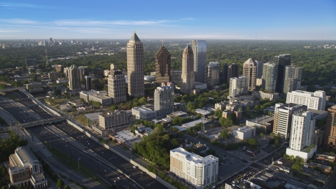 AX39_030.0000192F - Aerial stock photo of The skyscrapers of Midtown Atlanta, Georgia and the Interstate 85 freeway