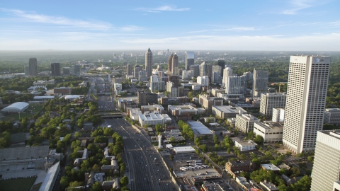 AX39_050.0000025F - Aerial stock photo of Downtown Connector while alongside One Atlantic Center, Midtown Atlanta