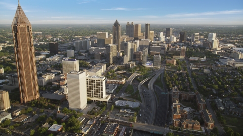 AX39_063.0000222F - Aerial stock photo of Downtown Connector toward Downtown skyscrapers, Atlanta