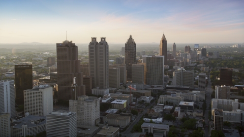 AX39_067.0000014F - Aerial stock photo of Downtown Atlanta skyscrapers and high-rises, Georgia, sunset