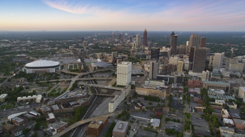 AX40_002.0000265F - Aerial stock photo of Georgia Dome near Downtown and Midtown Atlanta, Georgia, twilight