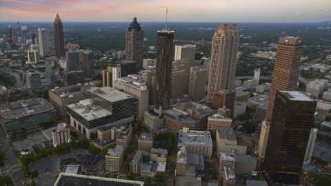 Westin Peachtree Plaza Hotel and skyscrapers in Downtown Atlanta, Georgia, twilight Aerial Stock Photos | AX40_004.0000430F