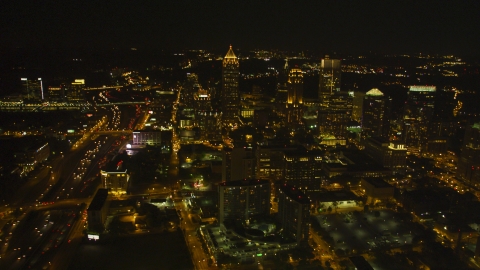 AX41_027.0000019F - Aerial stock photo of Tall skyscrapers and city buildings in Midtown Atlanta, Georgia, night