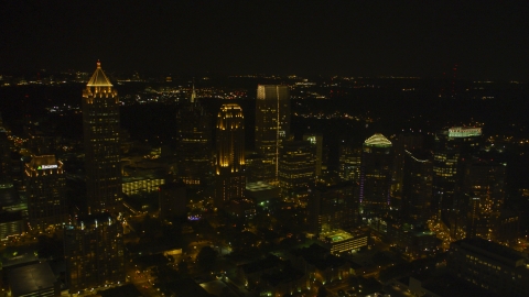 A group of skyscrapers at night in Midtown Atlanta, Georgia Aerial Stock Photos | AX41_028.0000078F