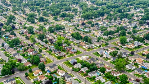 AXP071_000_0004F - Aerial stock photo of Homes in a Massapequa Park suburban neighborhood, Long Island, New York