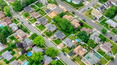 AXP071_000_0005F - Aerial stock photo of Suburban homes and quiet streets in Massapequa Park, Long Island, New York