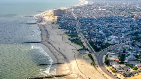 AXP071_000_0023F - Aerial stock photo of Sunbathers on the beach in Ocean City, New Jersey