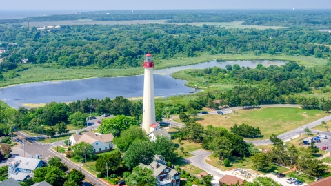 AXP072_000_0001F - Aerial stock photo of Cape May Lighthouse by Lighthouse Pond, New Jersey